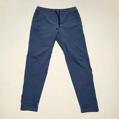 Pantalones de chándal UNRL para hombre grandes verde azulado rendimiento atléticos pierna cónica cordón Foto 1 de 4