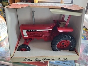 Ertl Farmall 706 1/16 Scale Toy Tractor Times  And Buckle Box Has Some Fading  - Picture 1 of 15