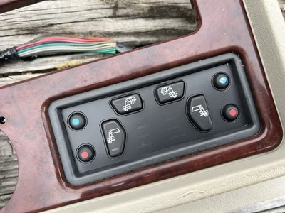 02-06 Cadillac Escalade Platinum Controles de asiento montados en consola delantera con bisel Foto 1 de 4