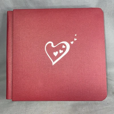 Álbum 7x7 recuerdos creativos corazón rojo plata en relieve con páginas Foto 1 de 3