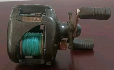Carrete de pesca vintage Mitchell Copperhead 300 de alto rendimiento Baitcasting  Foto 1 de 4