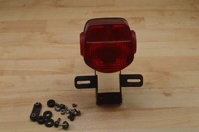 76 Kawasaki KZ400S, 74-79, A, C, D, S, conjunto de lanterna traseira OEM - Imagem 1 de 4