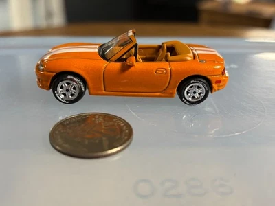 Mazda MX-5 Miata 1999 Johnny Lightning - neumáticos de goma Foto 1 de 4
