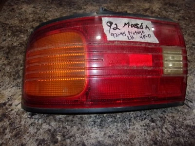 Задний фонарь в сборе 1992–95 Mazda Protege левый - Изображение 1 из 4