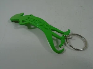 LLAVERO ABRIDOR DE BOTELLAS VERDE GEICO GECKO (MIRA) - Imagen 1 de 4