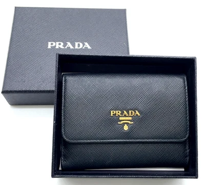 Auténtica Cartera Prada Negra Roja Blanca PVC Cuero Doble Plegable con Caja i110398 Foto 1 de 4