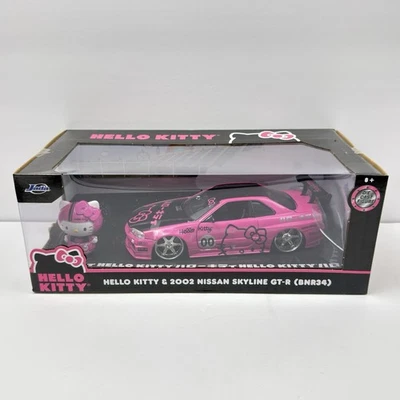 JADA TOYS Hello Kitty 2002 Nissan Skyline GT-R R34 1:24 Die Cast Car Figure 2021 - Image 1 of 4
