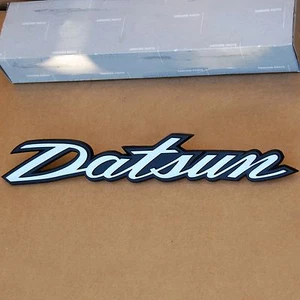 Datsun 240Z Genuine Deck Lid Hatch Emblem "Datsun" 1970-1973 | NOS, OEM - Picture 1 of 1