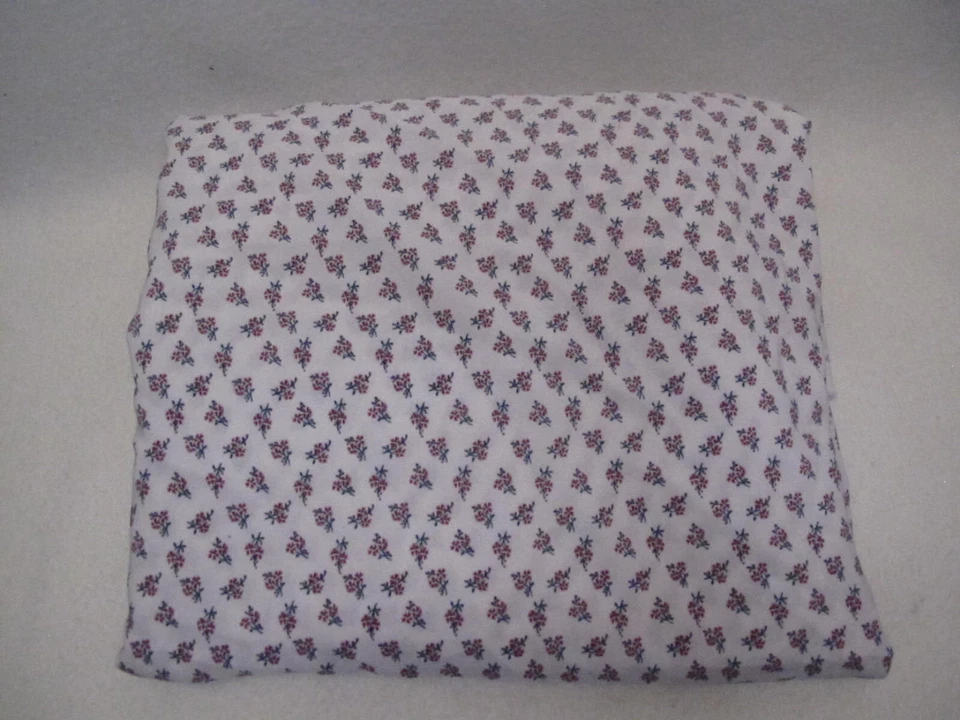 Joann Fabric~STRETCHY KNIT~Apparel Fabric~White~Floral~Spring~Bachelor's Buttons - Image 1 of 3