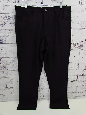 Pantalones elásticos de 4 vías DKNY City Tech calce ajustado negros para hombre talla 38 X 30 nuevos con etiquetas Foto 1 de 4