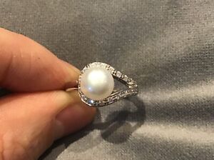 0.25 Carat Diamond & Fresh Water White Pearl Ring In A Platinum Finish O & Half
