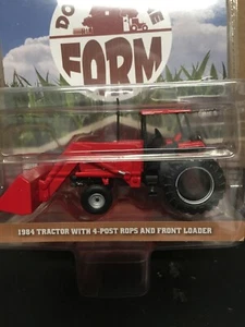 1:64 Greenlight 1984 tractor with 4-post rops & front loader - Picture 1 of 3