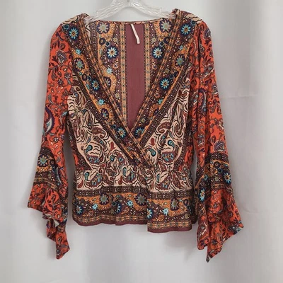 Top envolvente Free People talla S Rosalie multicolor boho fluido floral manga acampanada Foto 1 de 4