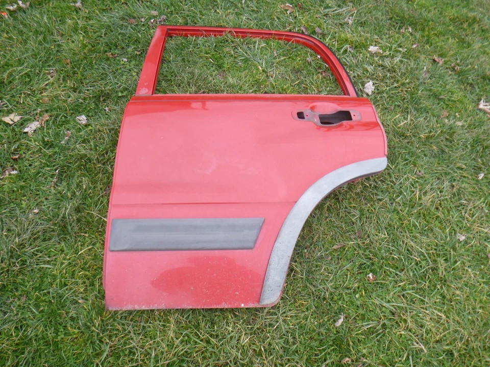 Chevrolet Tracker 2002 puerta delantera lado del conductor izquierda trasera roja Foto 1 de 4