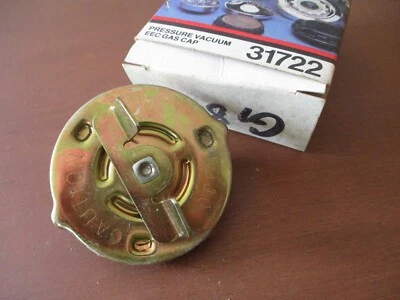 1971 1972 1973 1974 + CADILLAC OLDSMOBILE CHEVROLET PONTIAC + Gas Cap NOS - Image 1 of 2