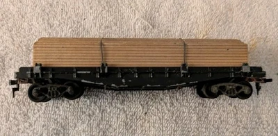 HO Scale All Metal Undecorated Flat Car With Lumber Load. Vintage  - Image 1 of 4