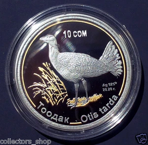 KYRGYZSTAN: 2015 silver color coin 10 Som DROFA TOODAK ANIMAL FAUNA PROOF - Picture 1 of 4