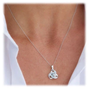 Savvy Cie Sterling Silver Diamond Love Knot Pendant Necklace Jewelry .10 ctw - Picture 1 of 2
