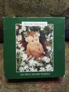 BRANDNEU Anne Geddes Baby in Gänseblümchen Ceaco 100-teiliges Puzzle vollständig 9 x 7 Zoll - Bild 1 von 2