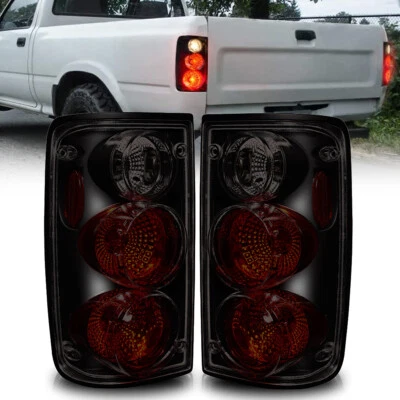 Par de luces traseras de humo negras para camioneta Toyota 1989-1995 Foto 1 de 4