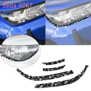 Borde de cejas para faros delanteros de carbono forjado para Toyot@ Hilux Revo 2015-21 - Imagen 1 de 10