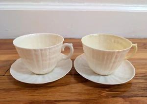 Set of 2 MCM BELLEEK Limpet Yellow White Seashell Teacup with 4" Saucer 5th Mark - Picture 1 of 9