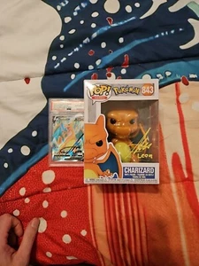 Alejandro Saab Signed Funko & PSA Auto Charizard V #153 Bundle - Picture 1 of 8