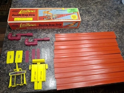 Tira de doble arrastre Johnny Lightning con caja original y extras años 70’s Foto 1 de 4
