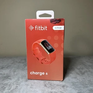 Fitbit Charge 6 Aktivitäts- und Fitnesstracker - Rot Koralle Champagner Goldband - Bild 1 von 7