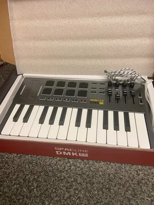 Donner DMK25 25-Key USB MIDI Keyboard Controller mit Drum Pads Studio Portable - Bild 1 von 4