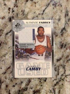 2003-04 SP Game Used Authentic Fabrics #MCJ Marcus Camby White Jersey