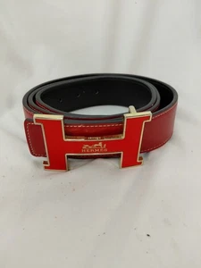 Ceinture réversible Hermès en cuir rouge/noir 38-42 - Photo 1/10