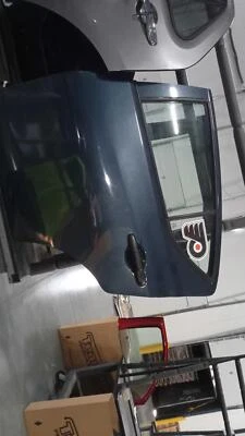 Nissan Versa 2017 puerta trasera izquierda azul 517799 usado 109 k millas pieza OEM Foto 1 de 2