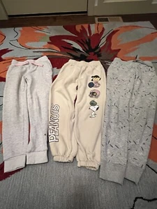 Girls 3 Pairs Of Sweatpants Puma Zara Star Wars Snoopy Size 7-8 - Picture 1 of 7
