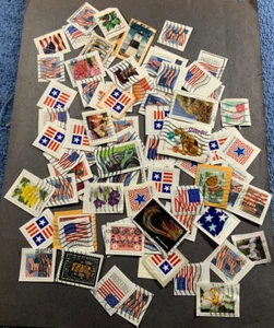 Mix of Recent Used US Stamps on paper. - Picture 1 of 3