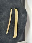 pair of gold tone speidel stretch watch bands mens and womens 3807jb