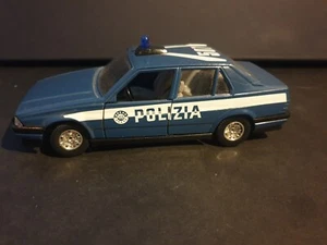 Modellino Die cast Bburago Alfa Romeo 75 Polizia 1/24 - Foto 1 di 12