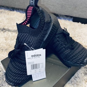 triple black nmd stlt