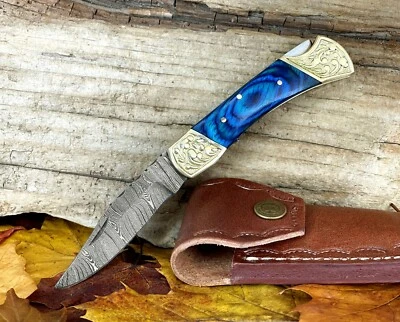 Damascus Steel Folding Pocket Knife With Brass Wood Handle + Leather Sheath  - Image 1 of 4