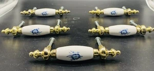 5 VINTAGE BRASS AND WHITE PORCELAIN DRAWER PULLS W/ BLUE FLOWER & MATCHING PULLS - Picture 1 of 6