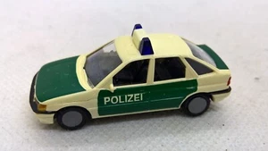 Praliné Ford Escort III Ghia Sedán Blanco Verde Menta POLICÍA (71) - Imagen 1 de 3