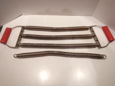 Ejercitador de pecho de resorte con mango Saf-Tee de colección tirar de pecho SEARS AÑOS 50 Foto 1 de 4