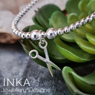 925 Sterling Silver stretch beaded Stacking Bracelet with Scissors charm By INKA - Image 1 of 4