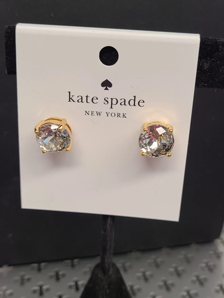 Pendientes pequeños transparentes Kate Spade New York Rise and Shine Foto 1 de 3