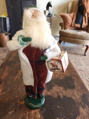 Byers' Choice Ltd.  1986 Santa Claus with Package. Signed on Base "Byers 86". - Image 1 of 4