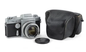 Topcon RE-2 35mm SLR film camera reflex Re Auto Topcor 58mm 1:1.8 kit - Imagen 1 de 15