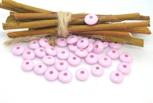 50 perles en bois plates rose pour attache tétine 10 mm Norme CE - Imagen 1 de 1