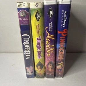 Walt Disney VHS Log Of 4 Jungle Book Aladdin Pinocchio Cinderella - Picture 1 of 9