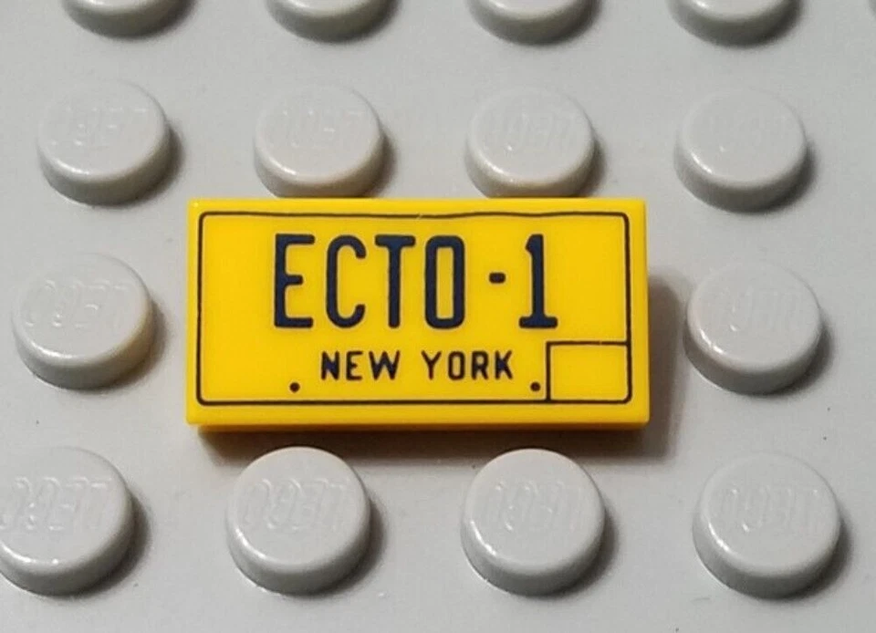 LEGO New York ECTO-1 LICENSE PLATE - 1x2 Yellow Orange Ghost Busters Tile 21108 - Image 1 of 1