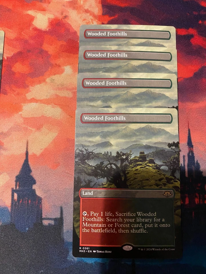MTG Modern Horizons 3 Wooded Foothills Borderless x 4 - Image 1 of 1